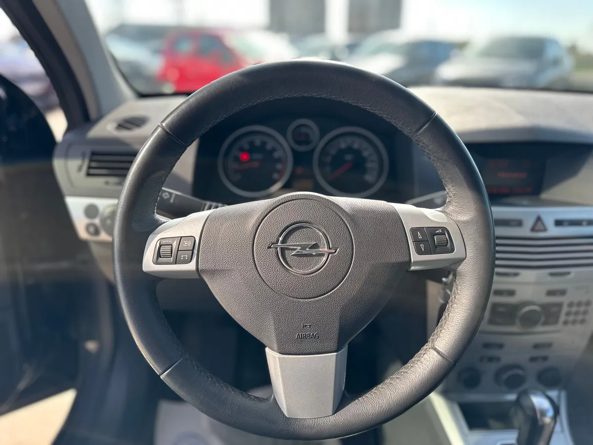 Opel Astra 1.8 AT (140 л.с.)