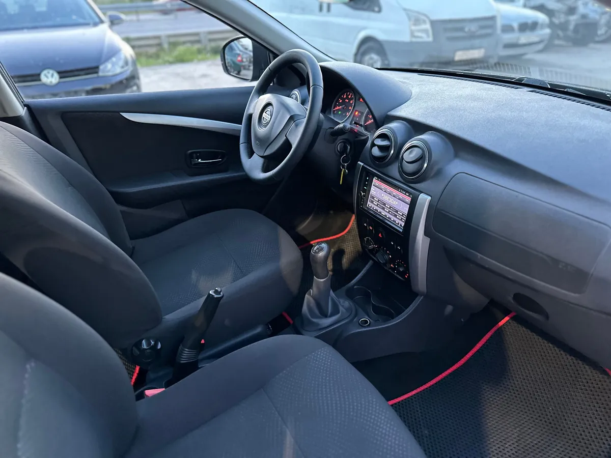 Nissan Almera 1.6 MT (102 л.с.)