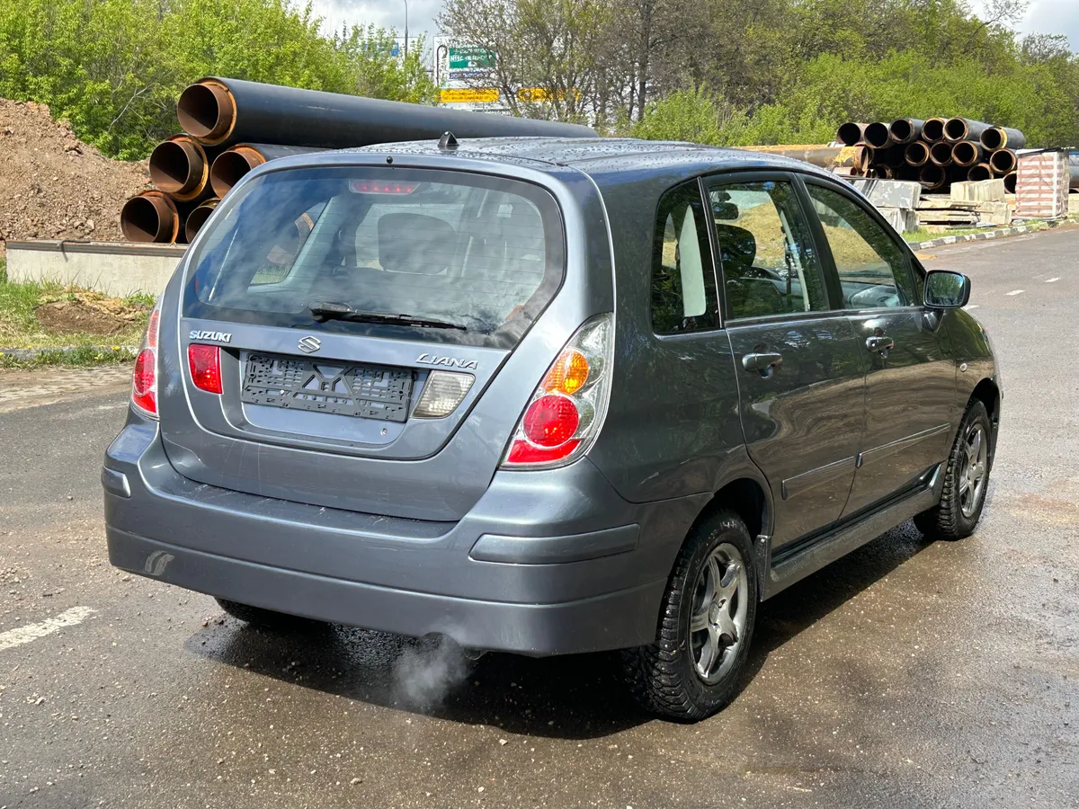 Suzuki Liana 1.6 AT 4WD (106 л.с.)