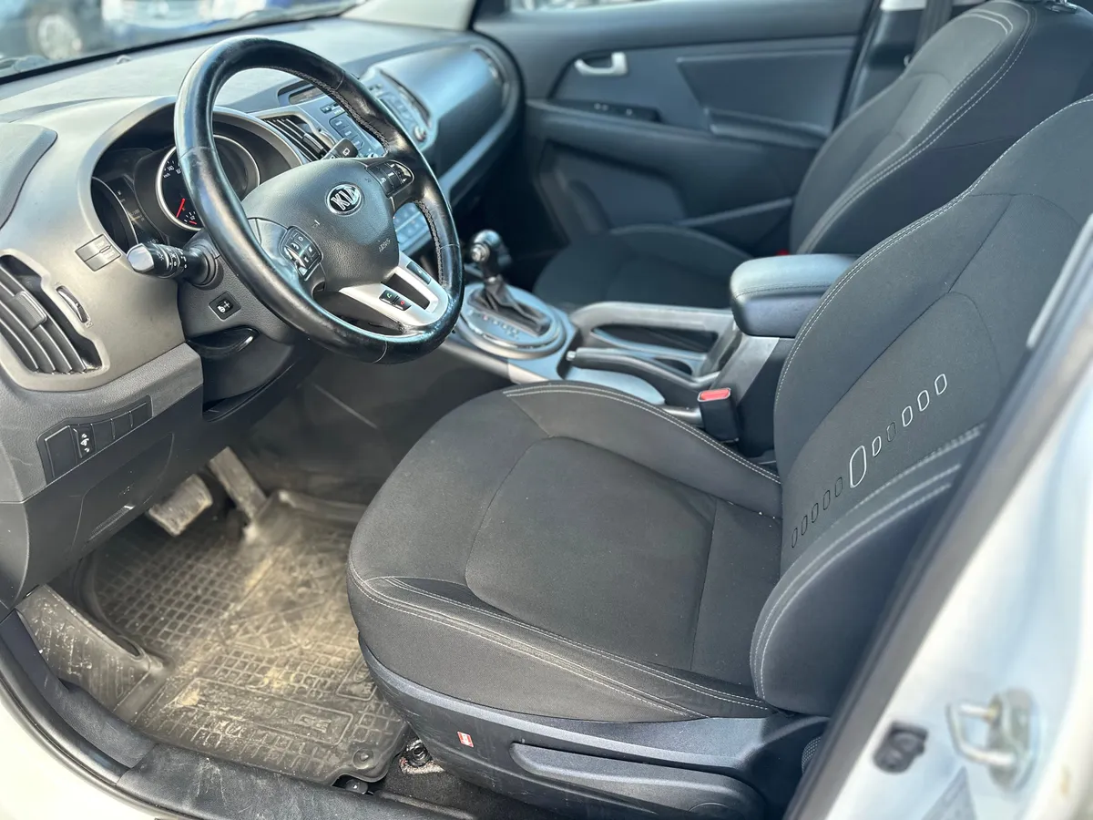 Kia Sportage 2.0 AT (150 л.с.)