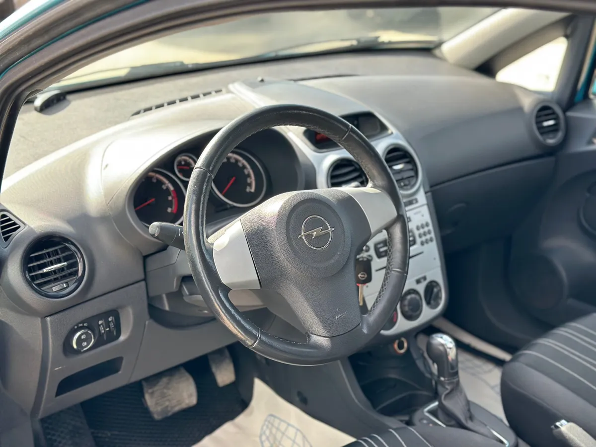 Opel Corsa 1.4 AT (100 л.с.)