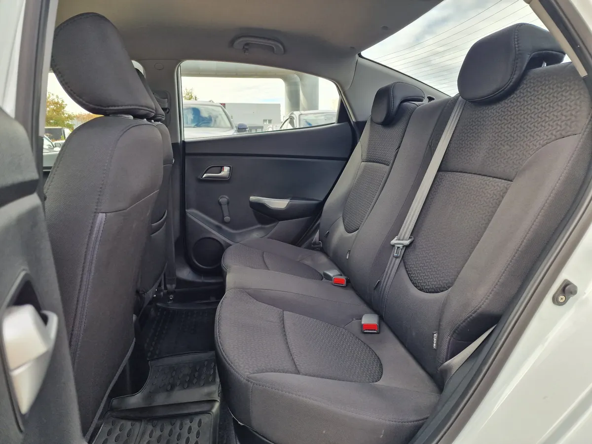 Kia Rio 1.4 AT (107 л.с.)