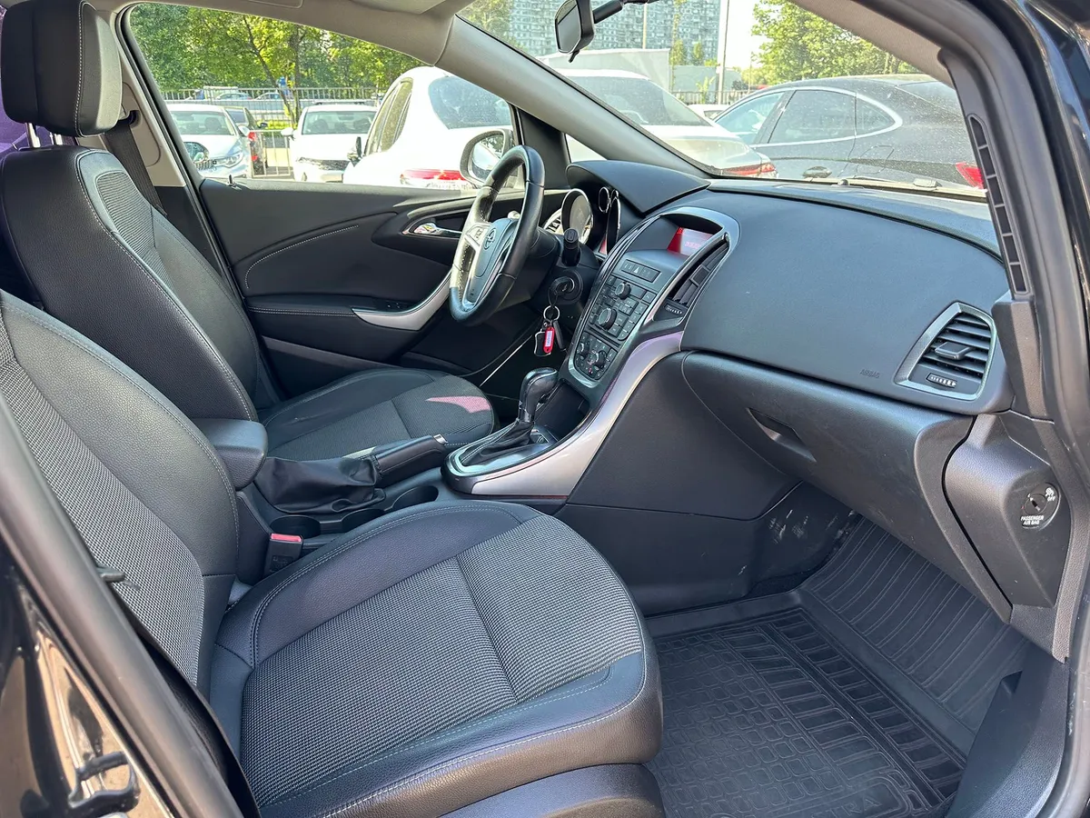 Opel Astra 1.6 AT (115 л.с.)