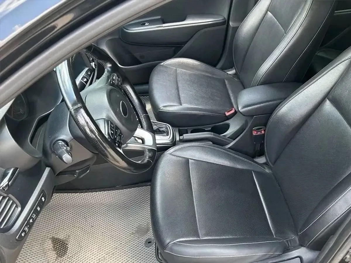 Kia Rio 1.6 AT (123 л.с.)