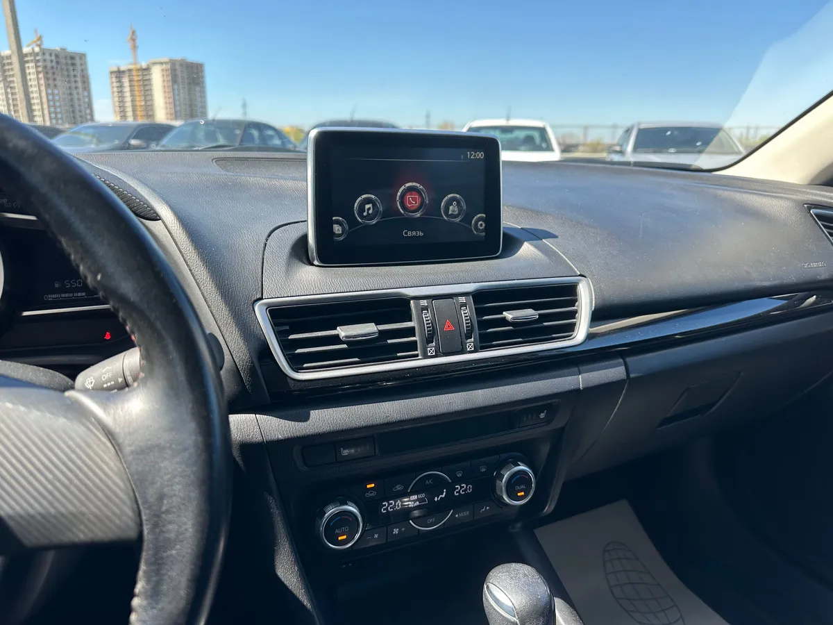 Mazda 3 1.6 AT (104 л.с.)