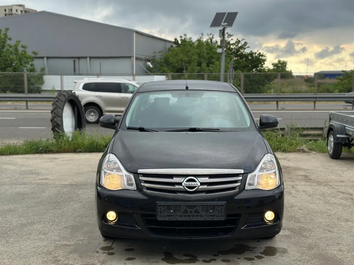 Nissan Almera 1.6 MT (102 л.с.)