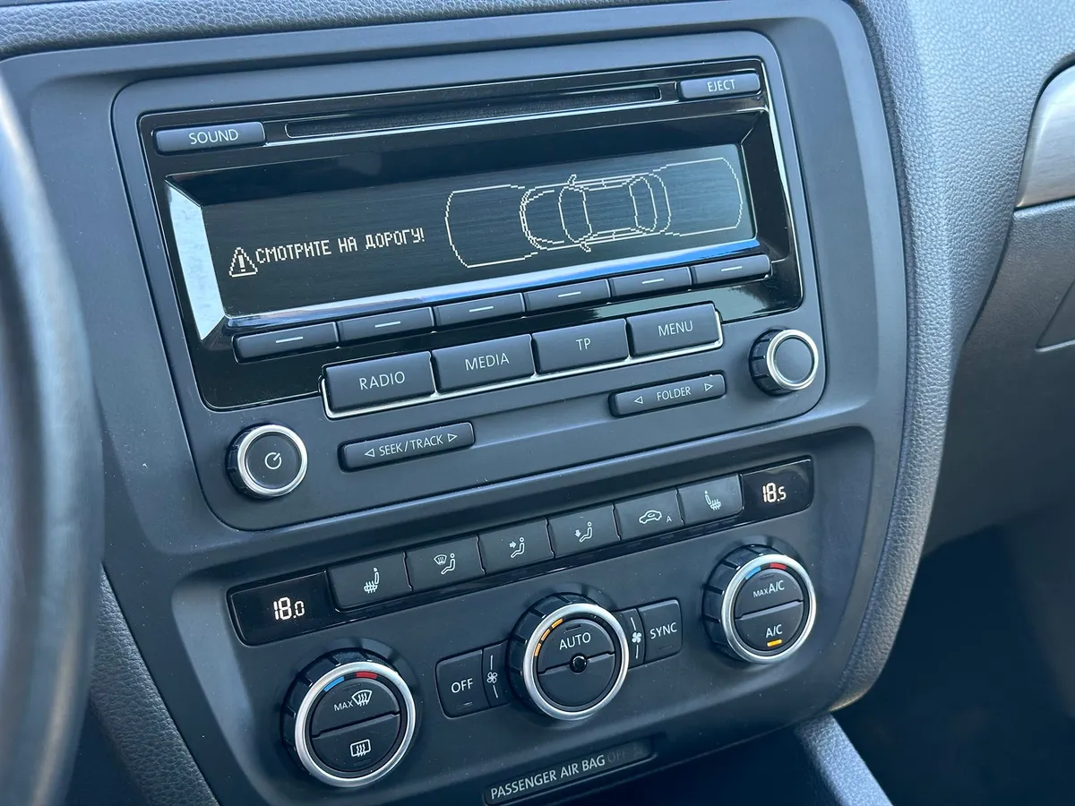 Volkswagen Jetta 1.6 MPI AT (110 л.с.)