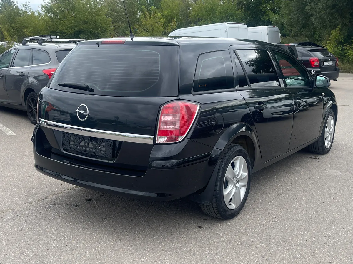 Opel Astra 1.6 MT (115 л.с.), 2012 — фото 4