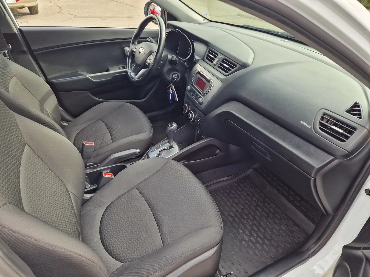 Kia Rio 1.4 AT (107 л.с.)