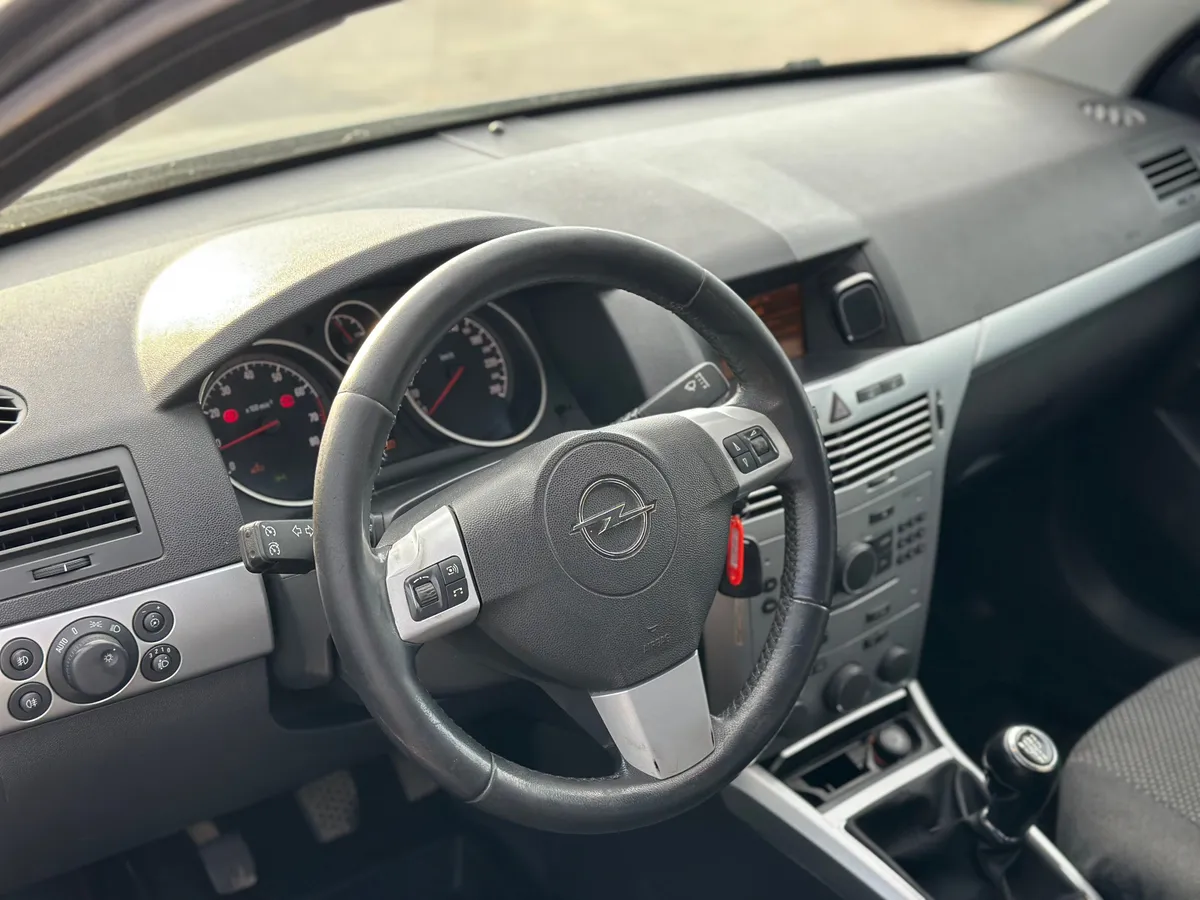 Opel Astra 1.6 MT (115 л.с.)