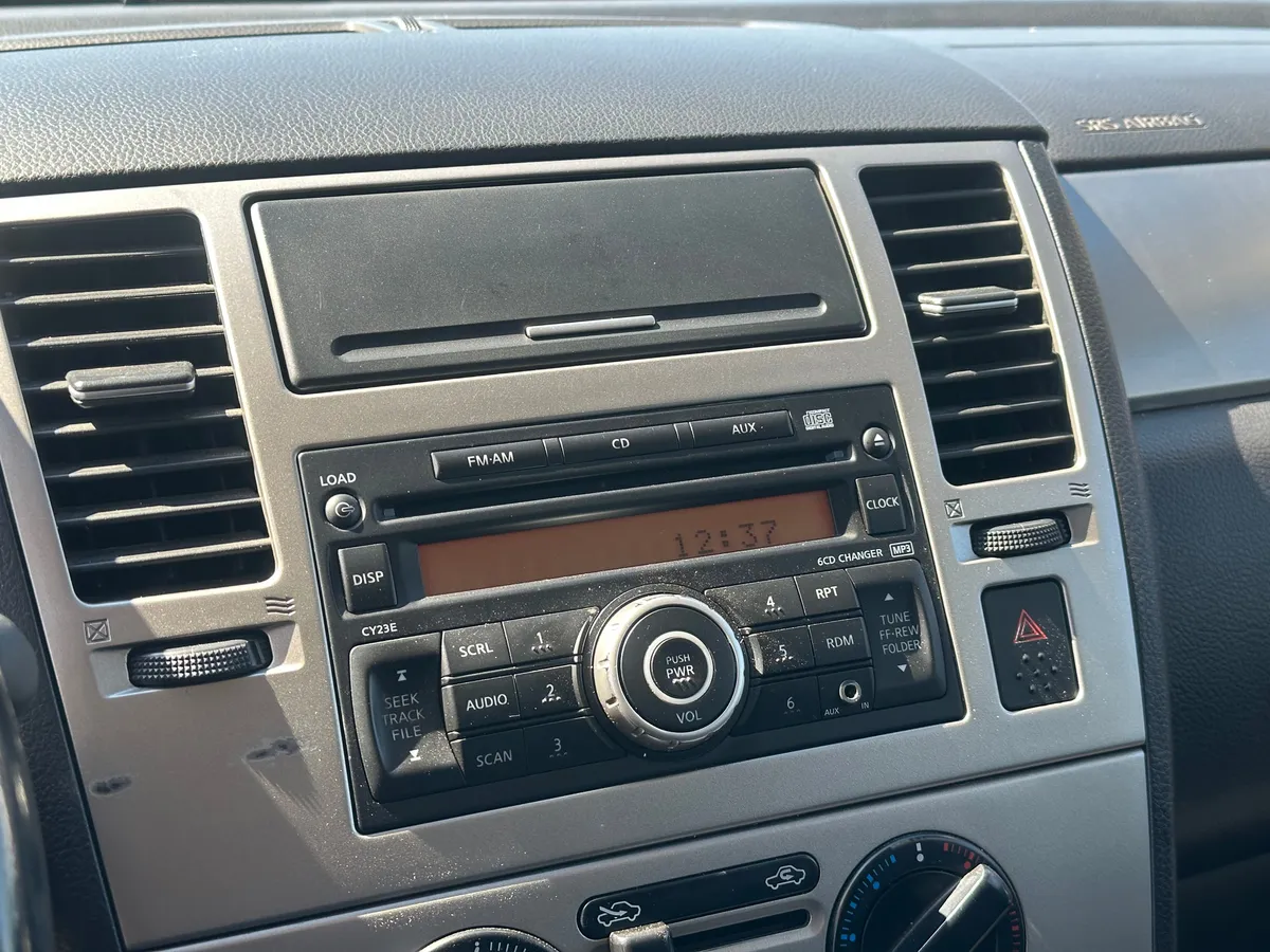 Nissan Tiida 1.6 AT (110 л.с.)