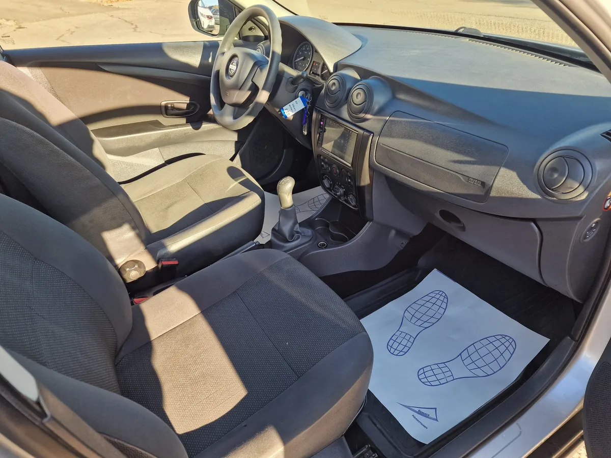 Nissan Almera 1.6 MT (102 л.с.)