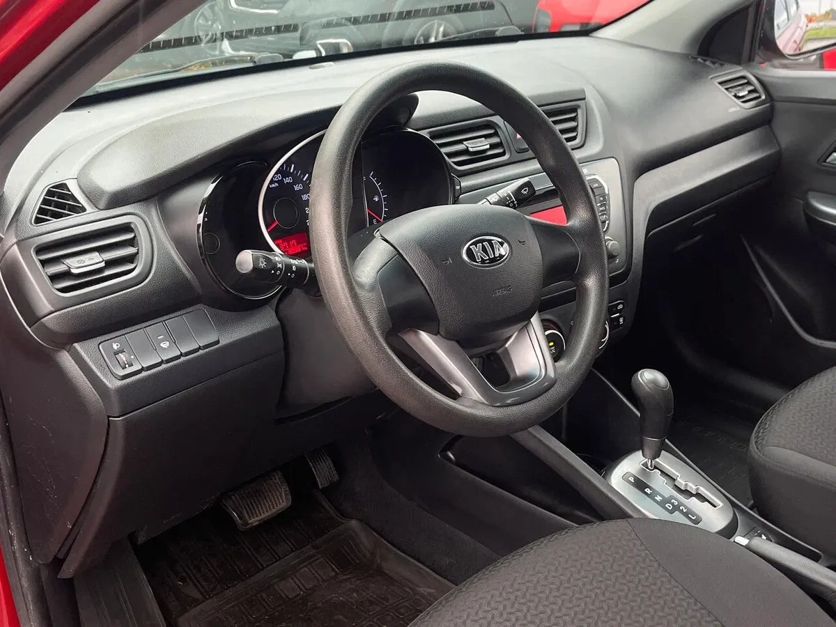 Kia Rio 1.6 AT (123 л.с.), 2013 — фото 6