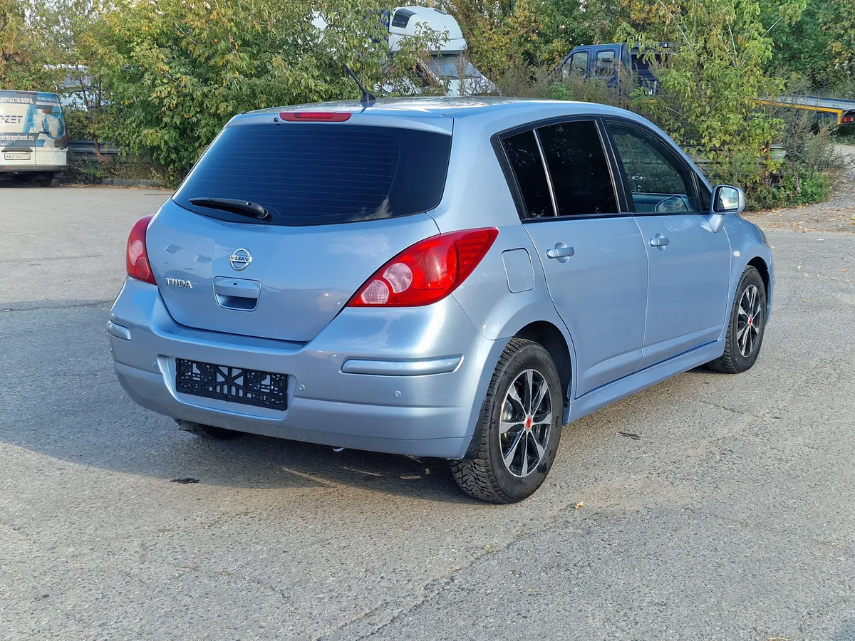 Nissan Tiida 1.6 AT (110 л.с.)