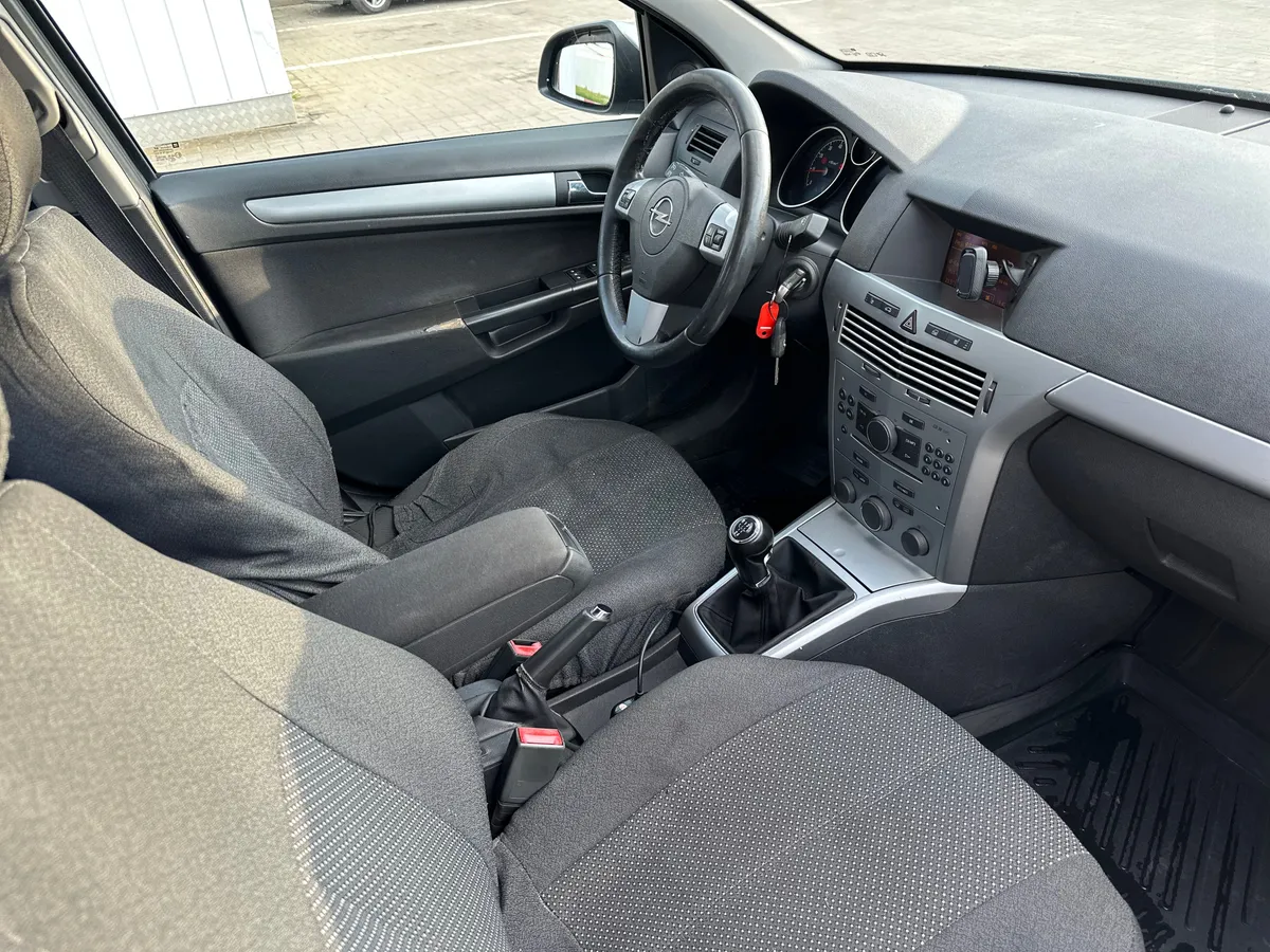 Opel Astra 1.6 MT (115 л.с.)