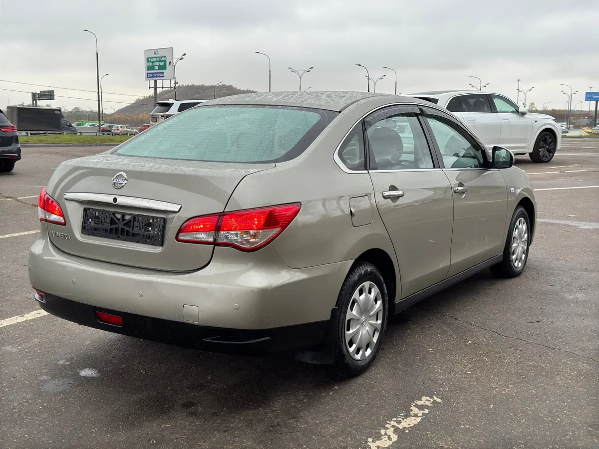 Nissan Almera 1.6 MT (102 л.с.)