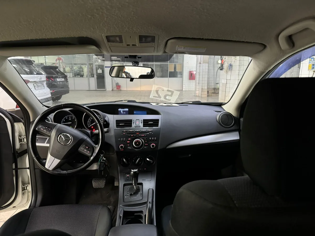 Mazda 3 1.6 AT (104 л.с.)