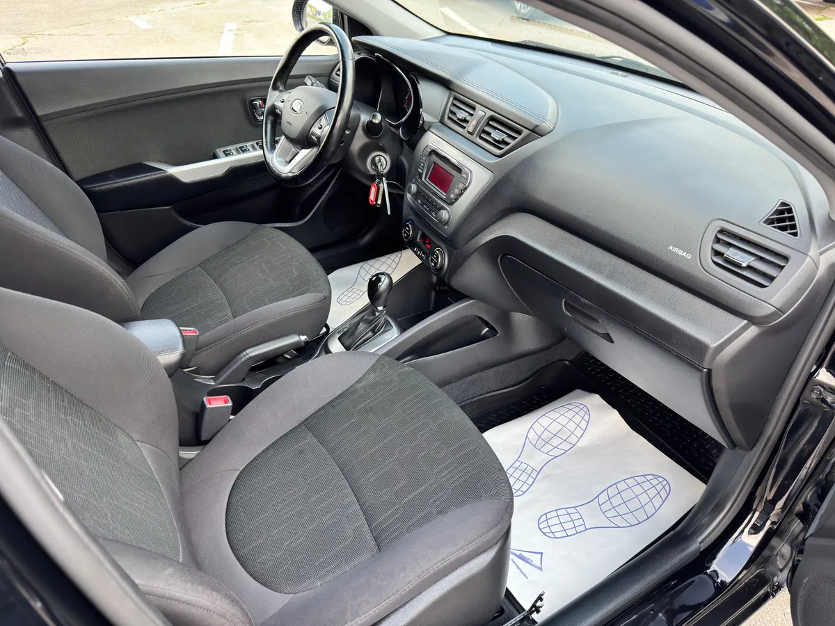 Kia Rio 1.6 AT (123 л.с.)