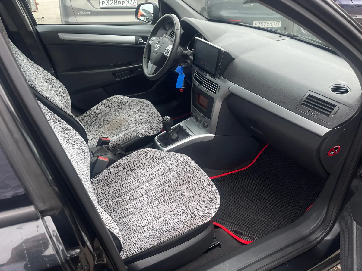 Opel Astra 1.6 MT (115 л.с.), 2012 — фото 6