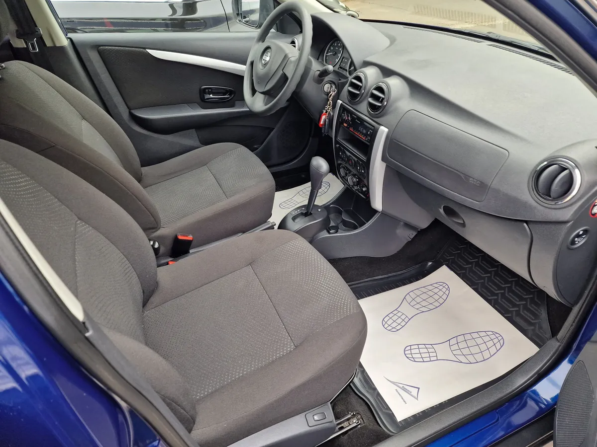 Nissan Almera 1.6 AT (102 л.с.)