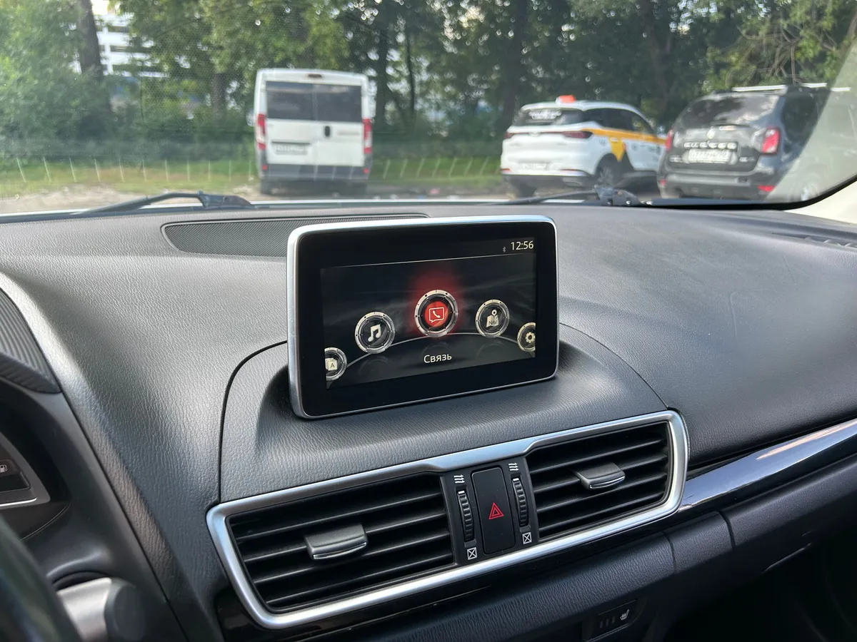 Mazda 3 1.6 AT (104 л.с.)