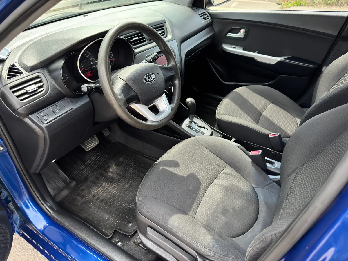 Kia Rio 1.6 AT (123 л.с.)
