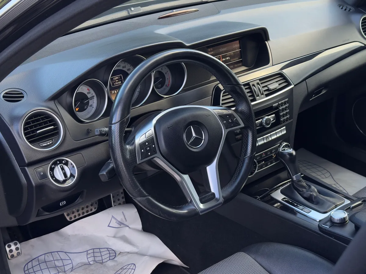 Mercedes-Benz C-Класс 1.6 AT (156 л.с.)