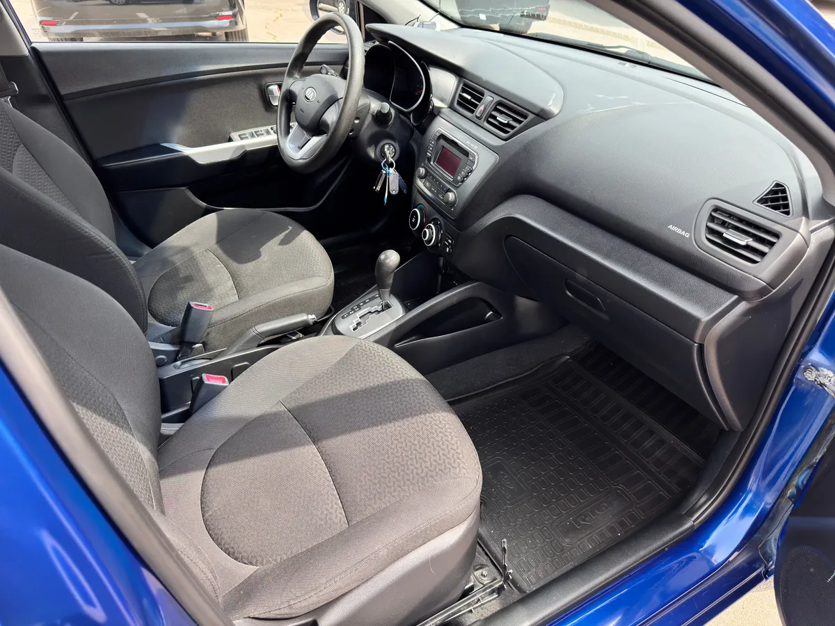 Kia Rio 1.6 AT (123 л.с.)