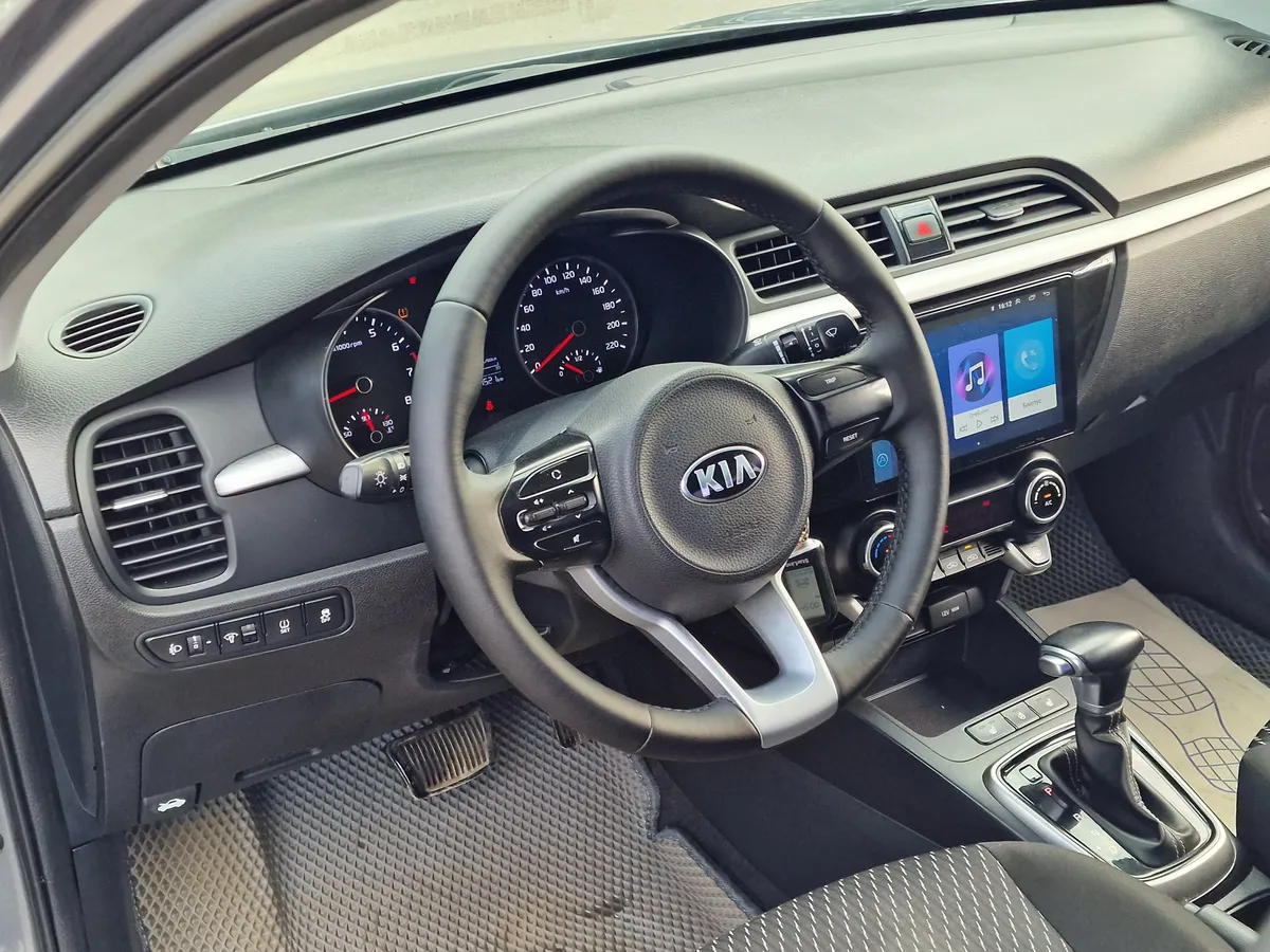 Kia Rio 1.6 AT (123 л.с.)