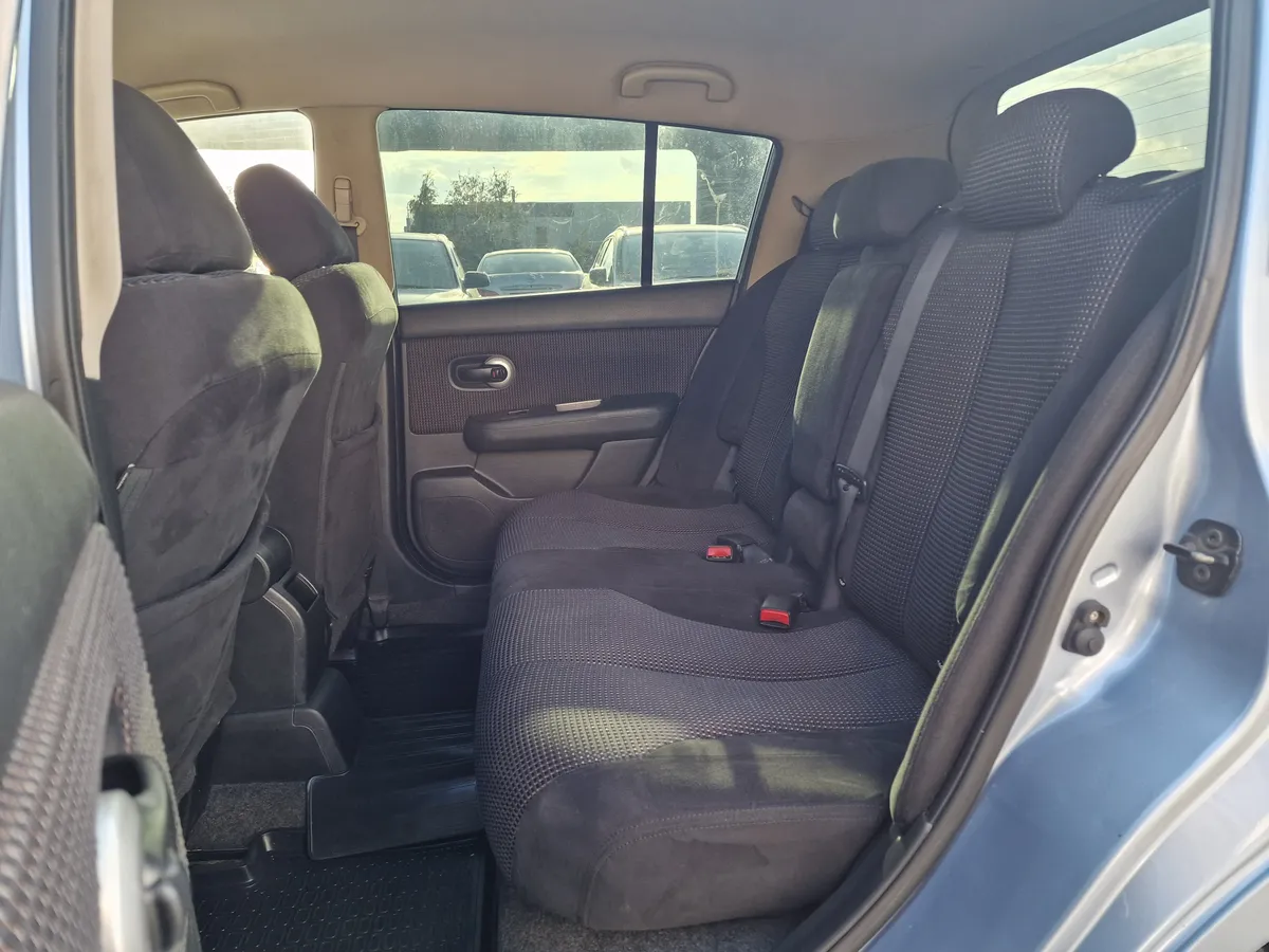 Nissan Tiida 1.6 AT (110 л.с.)