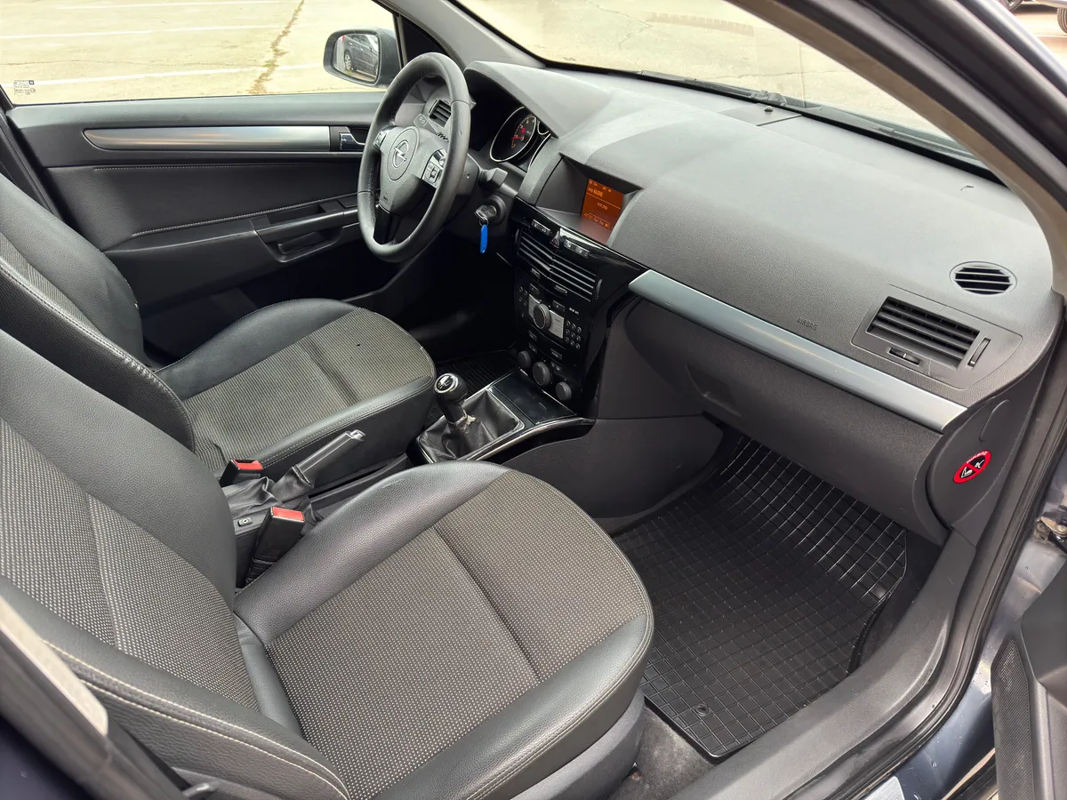 Opel Astra 1.6 MT (115 л.с.)