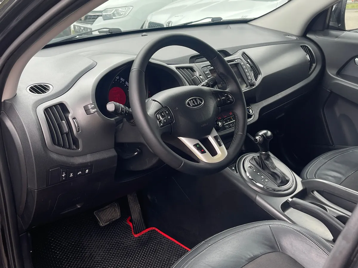 Kia Sportage 2.0 AT (150 л.с.), 2012 — фото 5