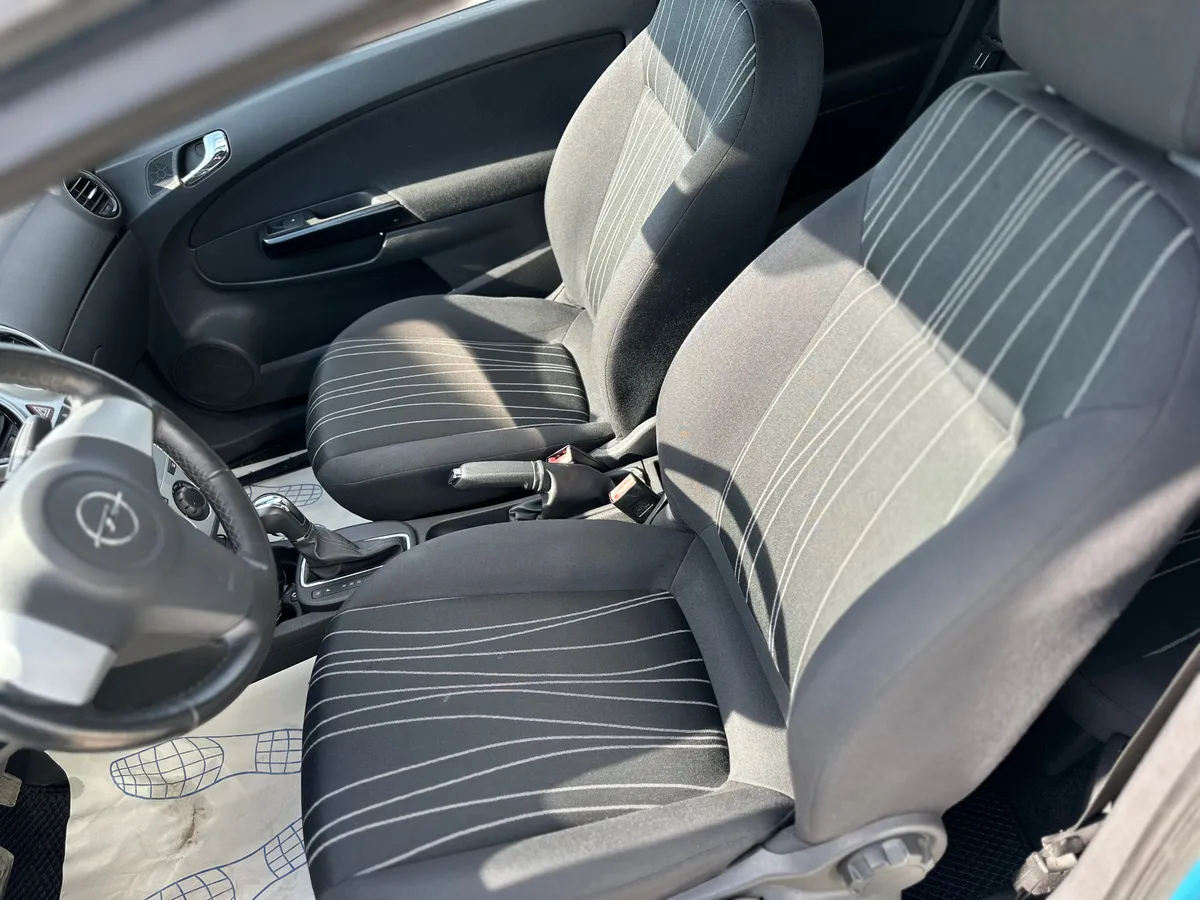 Opel Corsa 1.4 AT (100 л.с.)