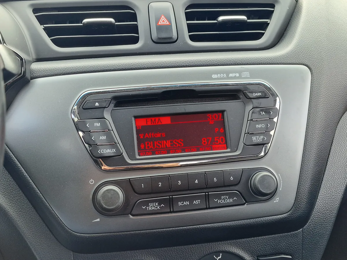 Kia Rio 1.4 AT (107 л.с.)