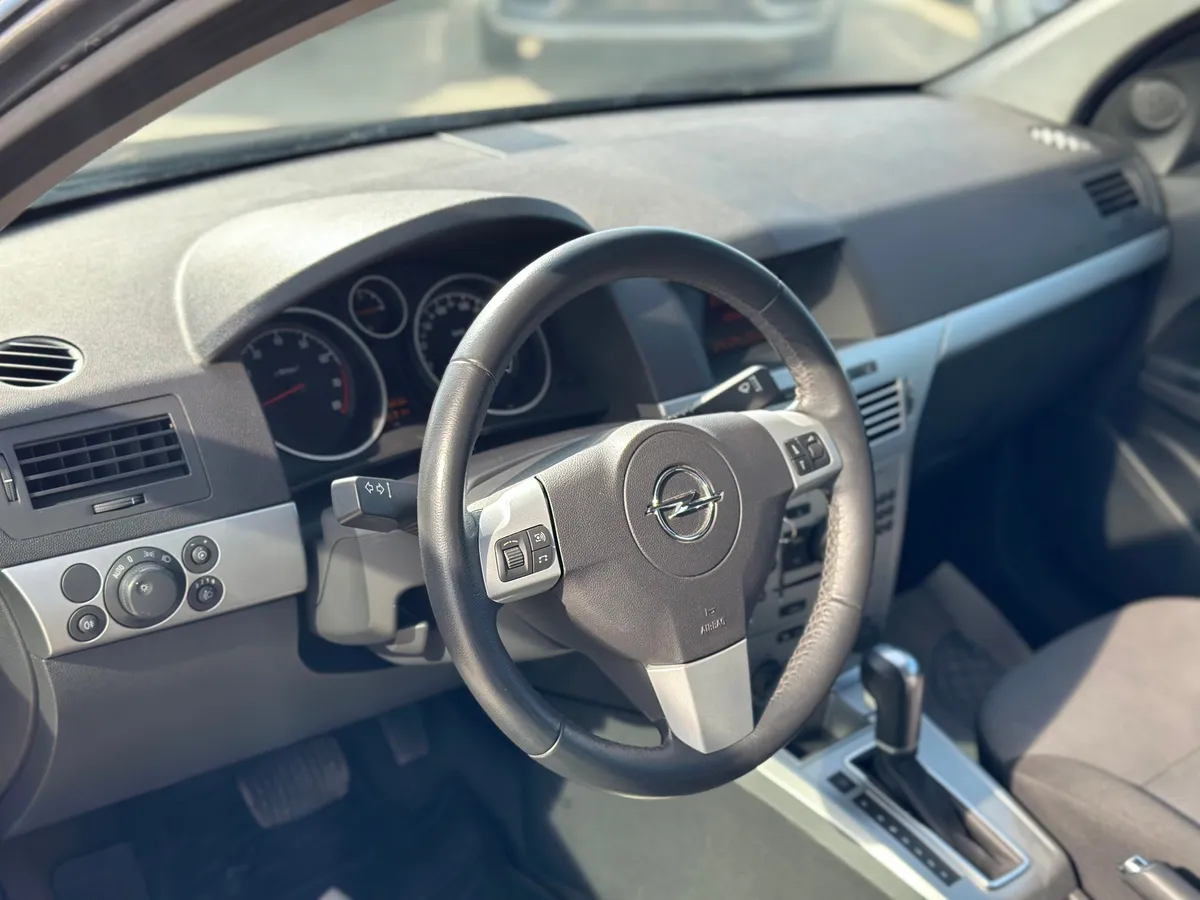 Opel Astra 1.8 AT (140 л.с.)