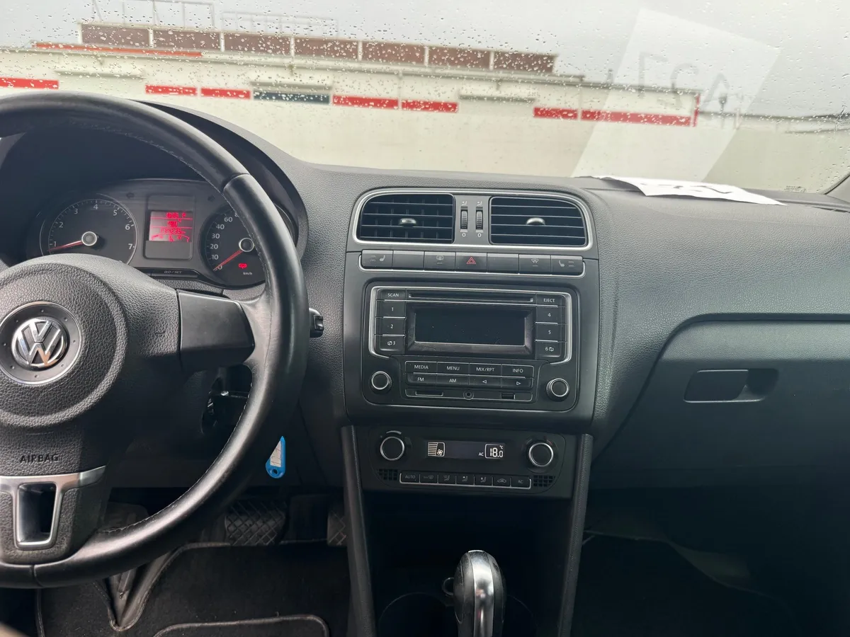 Volkswagen Polo 1.6 Tiptronic (105 л.с.)