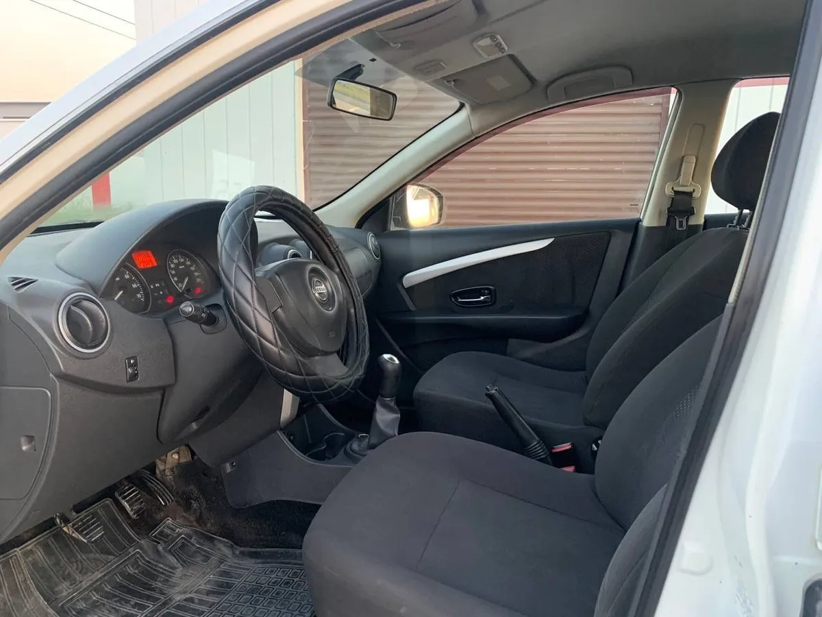 Nissan Almera 1.6 MT (102 л.с.)