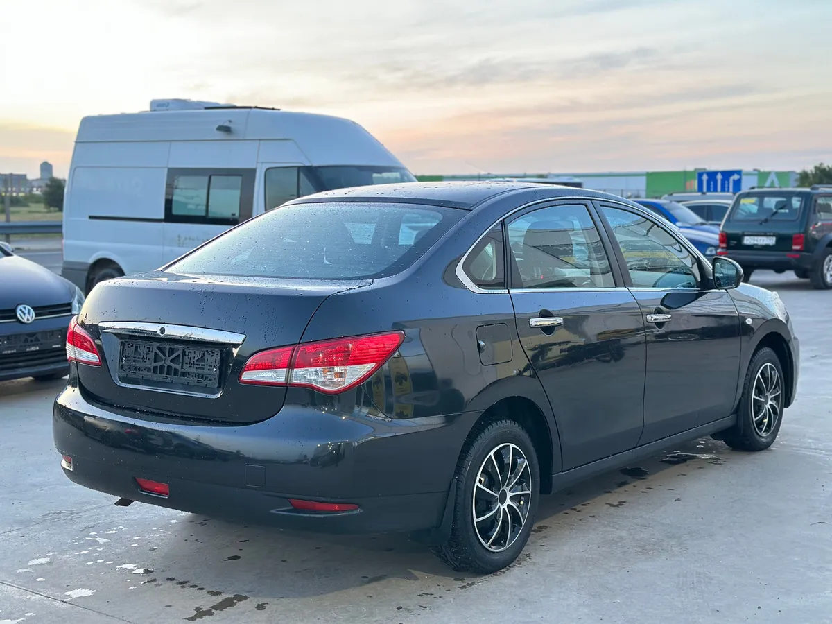 Nissan Almera 1.6 MT (102 л.с.)