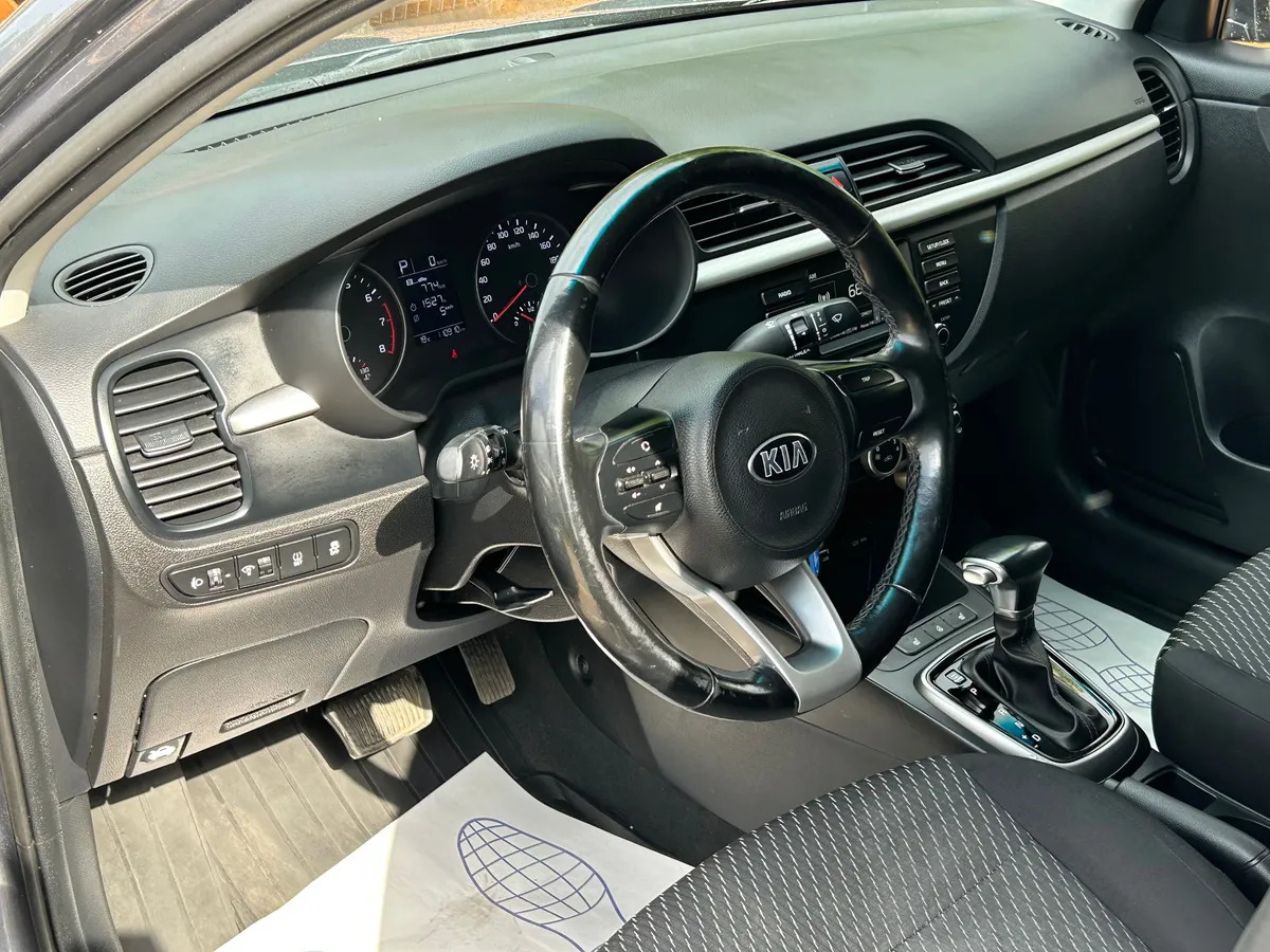 Kia Rio 1.4 AT (100 л.с.)