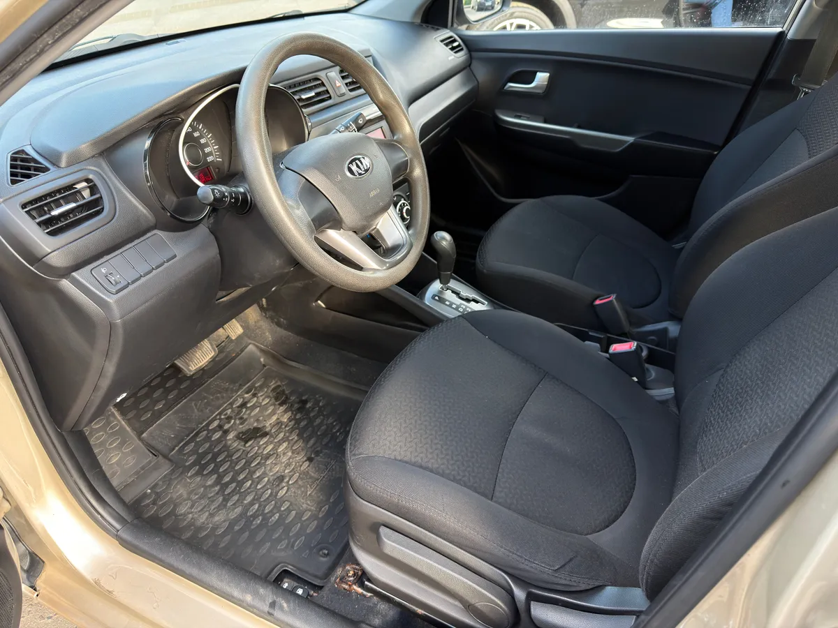 Kia Rio 1.4 AT (107 л.с.)