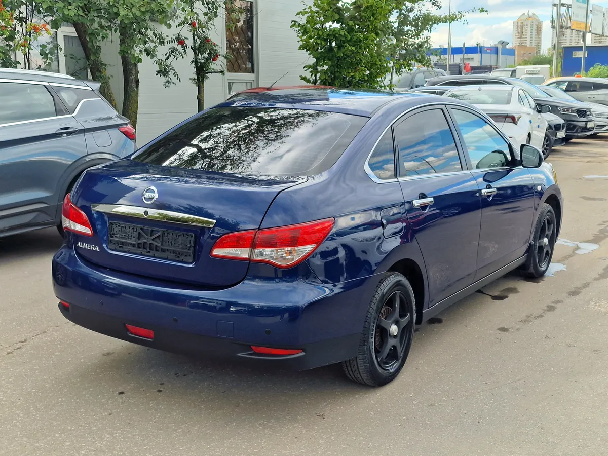 Nissan Almera 1.6 AT (102 л.с.)