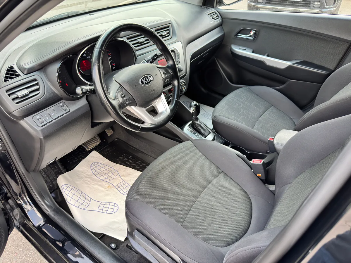 Kia Rio 1.6 AT (123 л.с.)