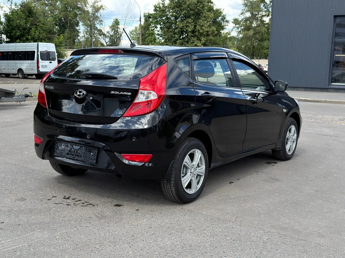 Hyundai Solaris 1.4 MT (107 л.с.), 2012 — фото 4