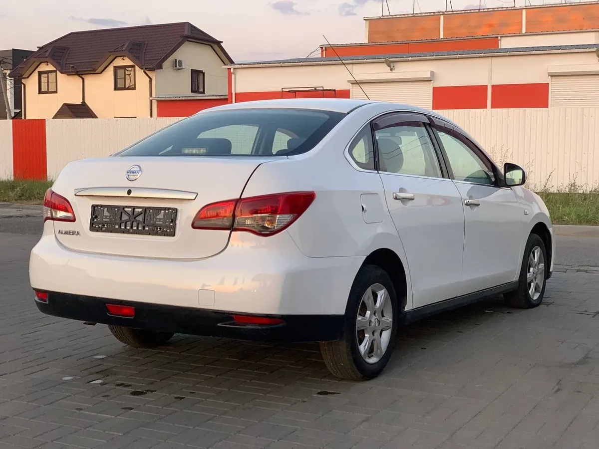 Nissan Almera 1.6 MT (102 л.с.)