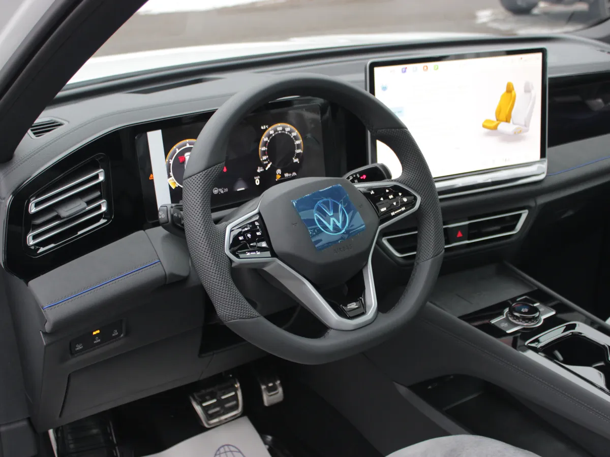 Volkswagen Tiguan 2.0 AMT 4WD (220 л.с.)