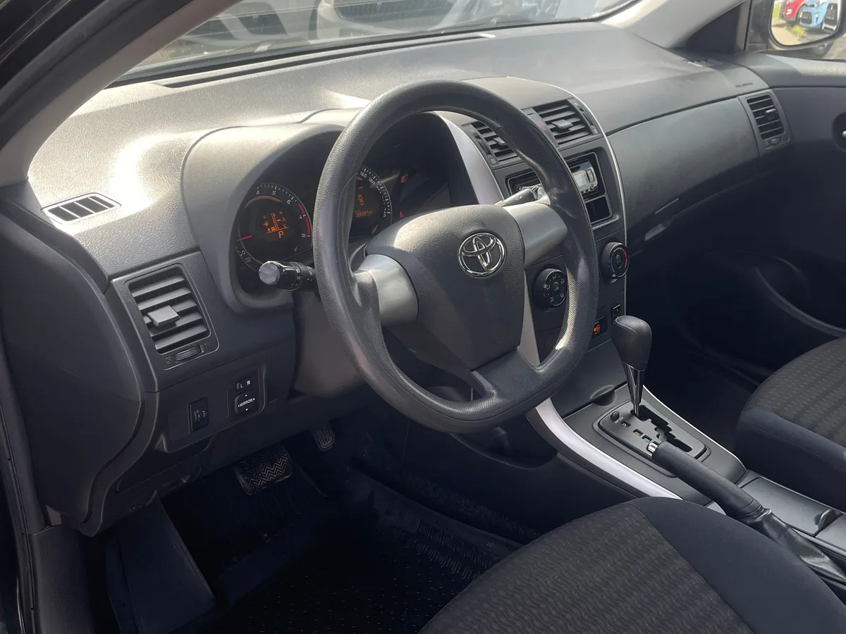 Toyota Corolla 1.6 AT (124 л.с.), 2011 — фото 6