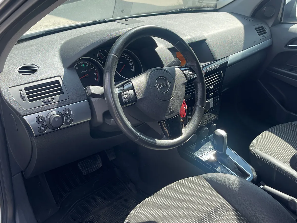 Opel Astra 1.8 AT (140 л.с.), 2012 — фото 5