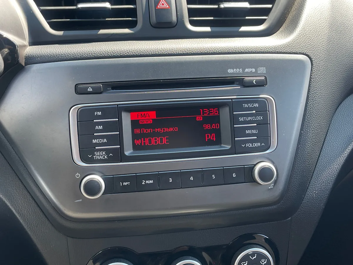 Kia Rio 1.4 AT (107 л.с.), 2015 — фото 8