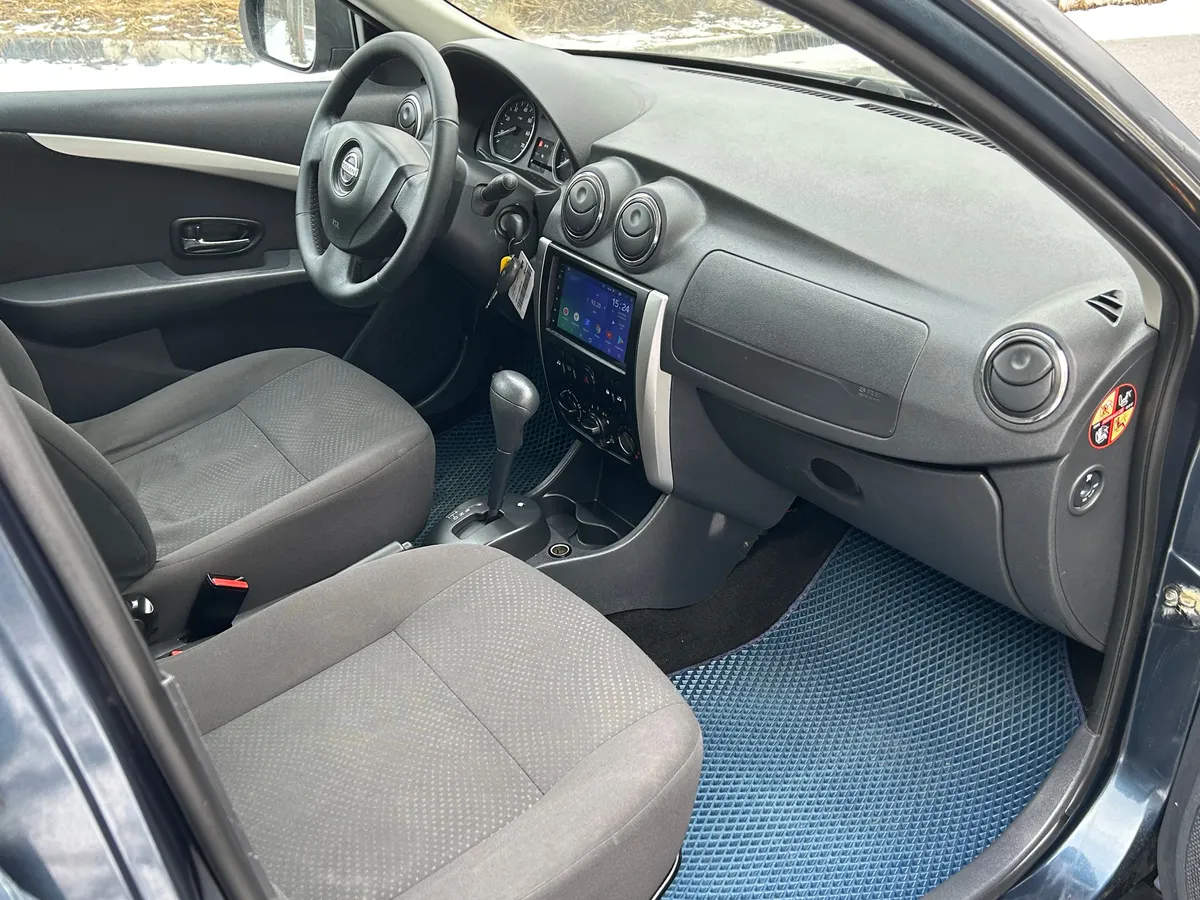 Nissan Almera 1.6 AT (102 л.с.)