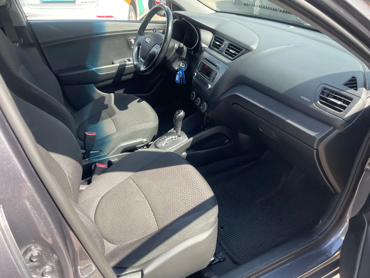 Kia Rio 1.4 AT (107 л.с.), 2015 — фото 6